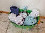 Dog towels, sheets, bowls, and potty bags for doggy use. 
